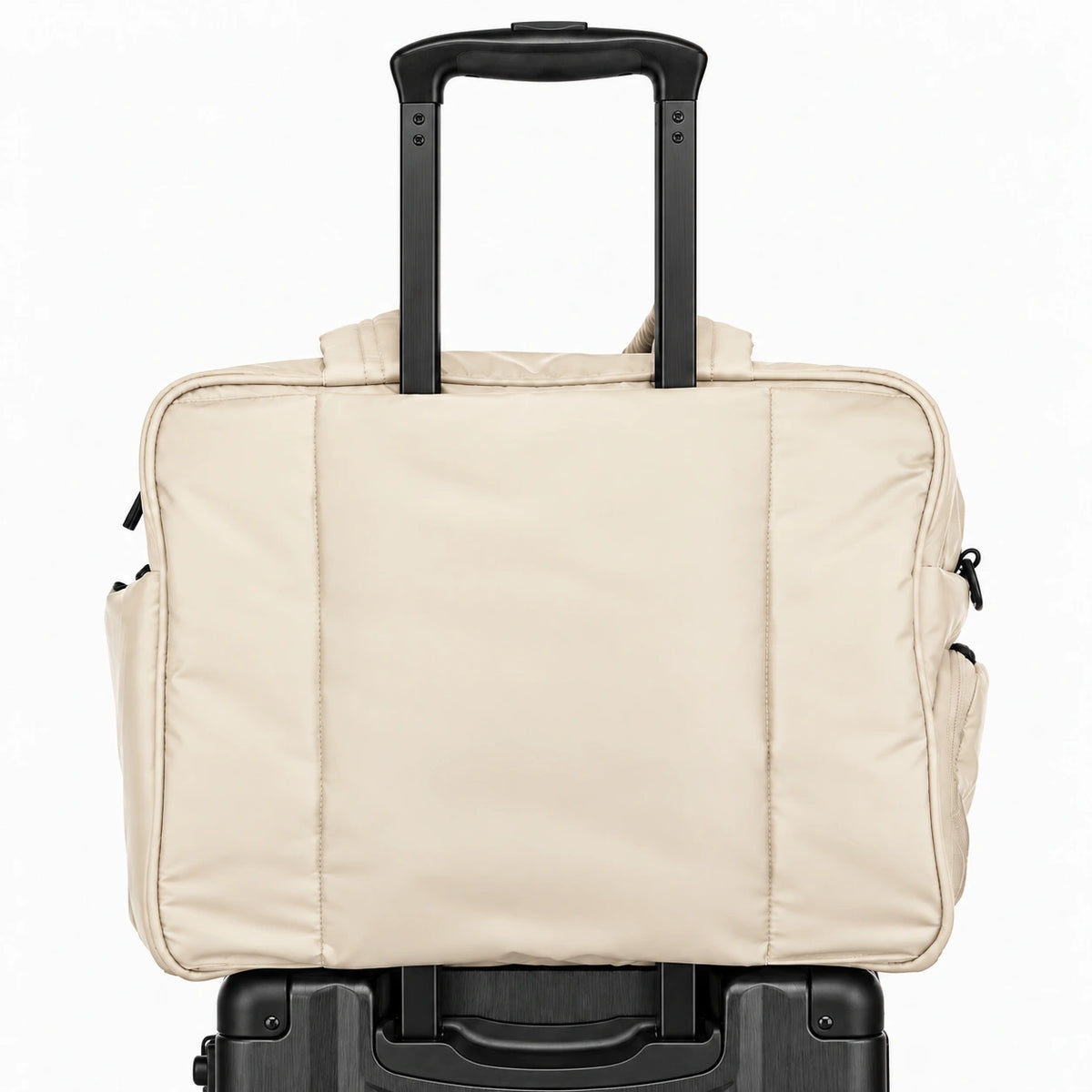 Cream All-Day Tote - rear sleeve on a suitcase handle