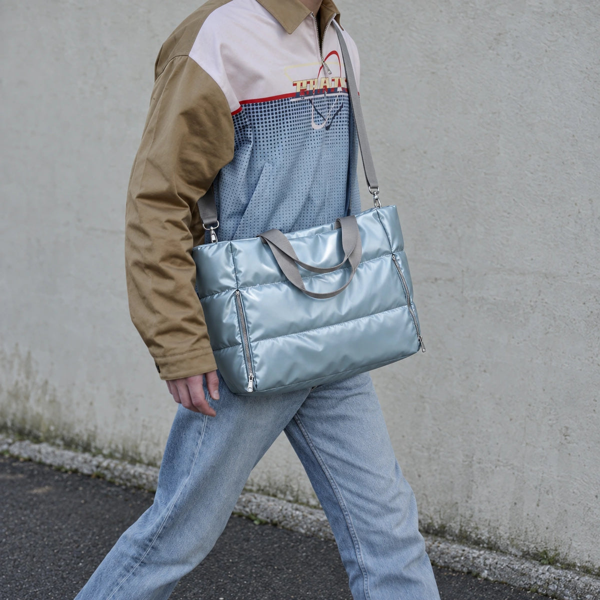 Blue Everyday Puffer — walking lifestyle photograph