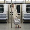 Silver Everyday Puffer — subway lifestyle photograph